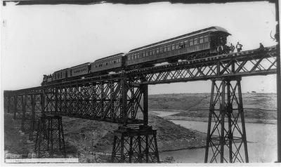 The Encarnation Bridge, Mexico [train on bridge], 1884