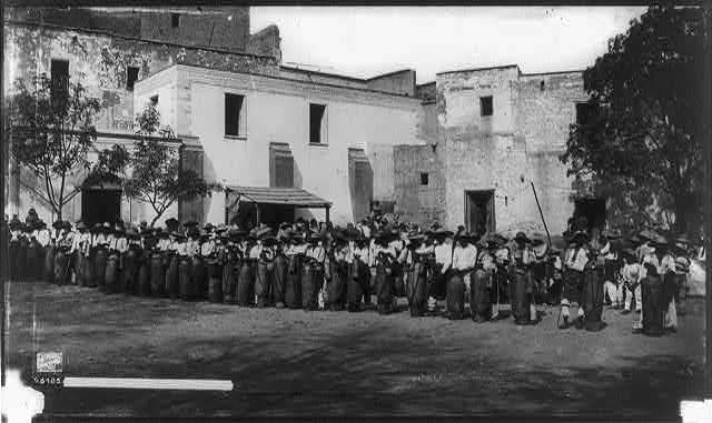 Water carriers at the fountain, [Mexico], 1884