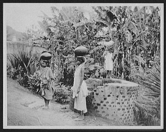 Two Tamil women with large pots on their heads at the well of the…, Sri Lanka, 1895