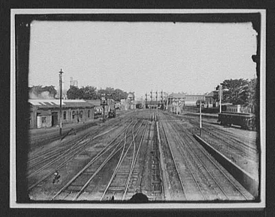 Ground level view of freight yards, New Zealand, 1895