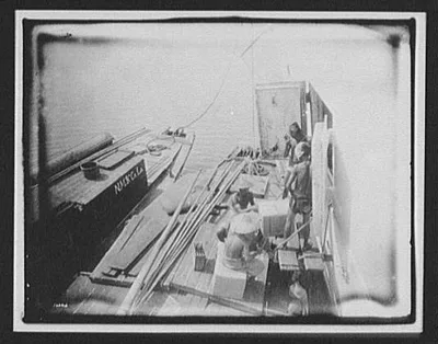 Coolies working on barge, China, 1895