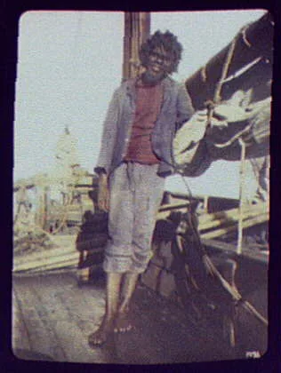 Native crewman on deck of ship, Yemen, Aden, 1894