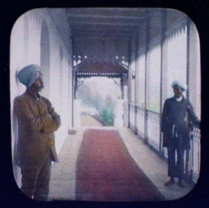 Jacob and Andy; two turbanned men standing in red-carpeted hallway, India, 1895