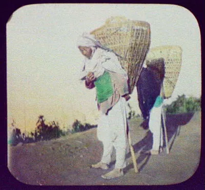 Darjeeling - two men carrying baskets of tea, Darjeeling, India, 1895