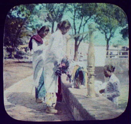 Street toilets - three women washing clothes, Java, Indonesia, 1895