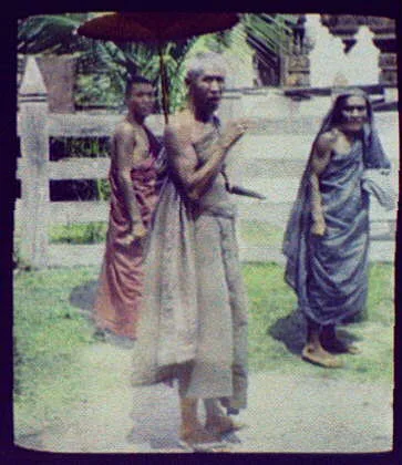 Three priests (?) walking, Java, Indonesia, 1895