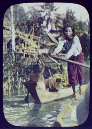 Woman poleing [sic] small boat, Java, Indonesia, 1895