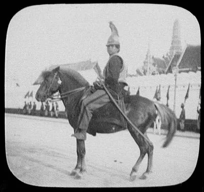 Bangkok - mounted Siamese cavalryman; palace in background, Thailand, 1895