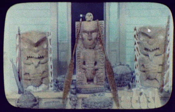 Maori wood carvings, including large and small idols and canoe paddles, New Zealand, 1895
