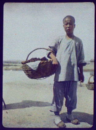 Peddler with basket, China, 1895