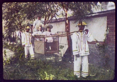 Chefoo - English children in sedan chair, Yantai, China, 1895