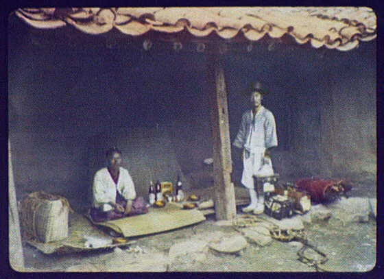 Seoul - 2 Koreans with wine, biscuits & baggage preparing meal at a…, Seoul, Korea, 1895