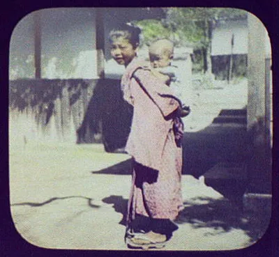 Mother carrying baby on back, Japan, 1895