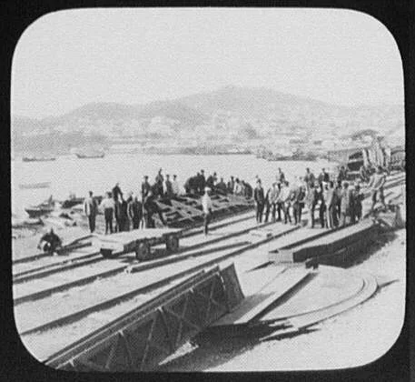 Vladivostok - laborers at dockside railroad tracks; city and harbor…, Russia, Vladivostok, 1895