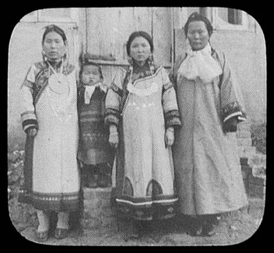 Wives of Goldi chiefs in their best clothes, Siberia, 1895