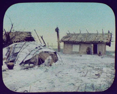 Goldi village on the Amur, north of Khabarovsk; dog tied in foreground, Siberia, 1895