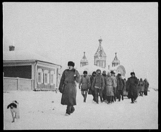 Khabarovsk (?) - convicts marching under guard; church in background, Khabarovsk, Russia, 1895