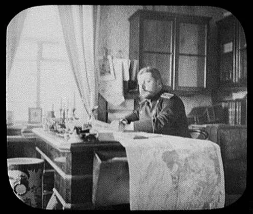 M. Kamorsky - Russian officer at his desk with large map spread -…, Russia, Khabarovsk, 1895