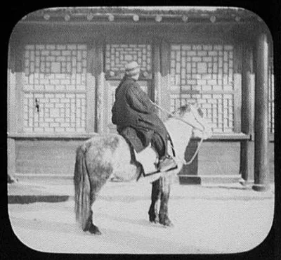 Manchu horseman in village across Amur River from Blagovestchenck…, Manchuria, China, 1895