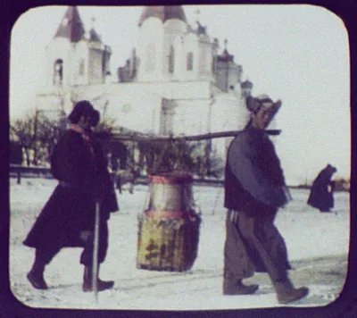 Irkutsk (?) - 2 men (Mongols?) carrying load on pole between their…, Irkutsk, Russia, 1896