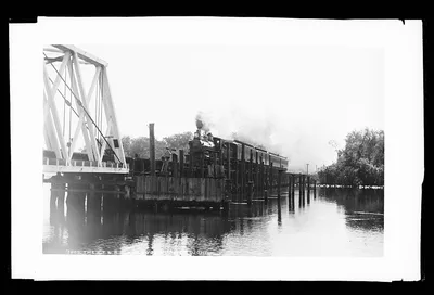 The J.T. & K.W. Ry. crossing the St. John's, Florida, 1880